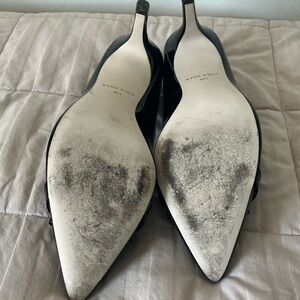 Black patent leather Cole Haan pumps
